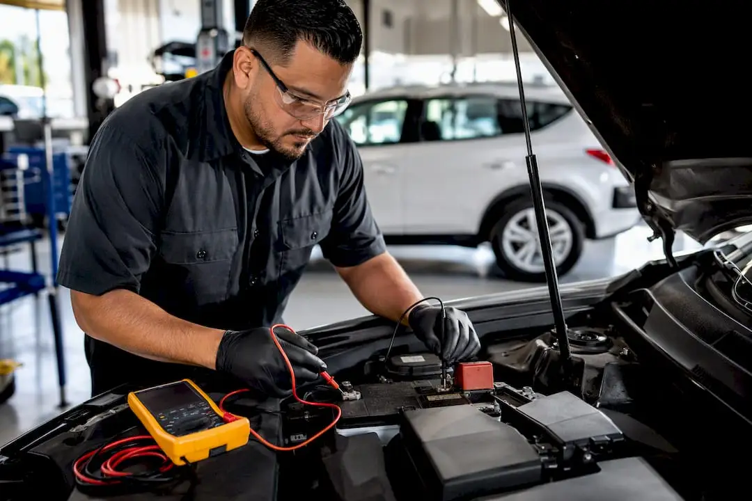 Multimeter testing anonymous vehicle battery